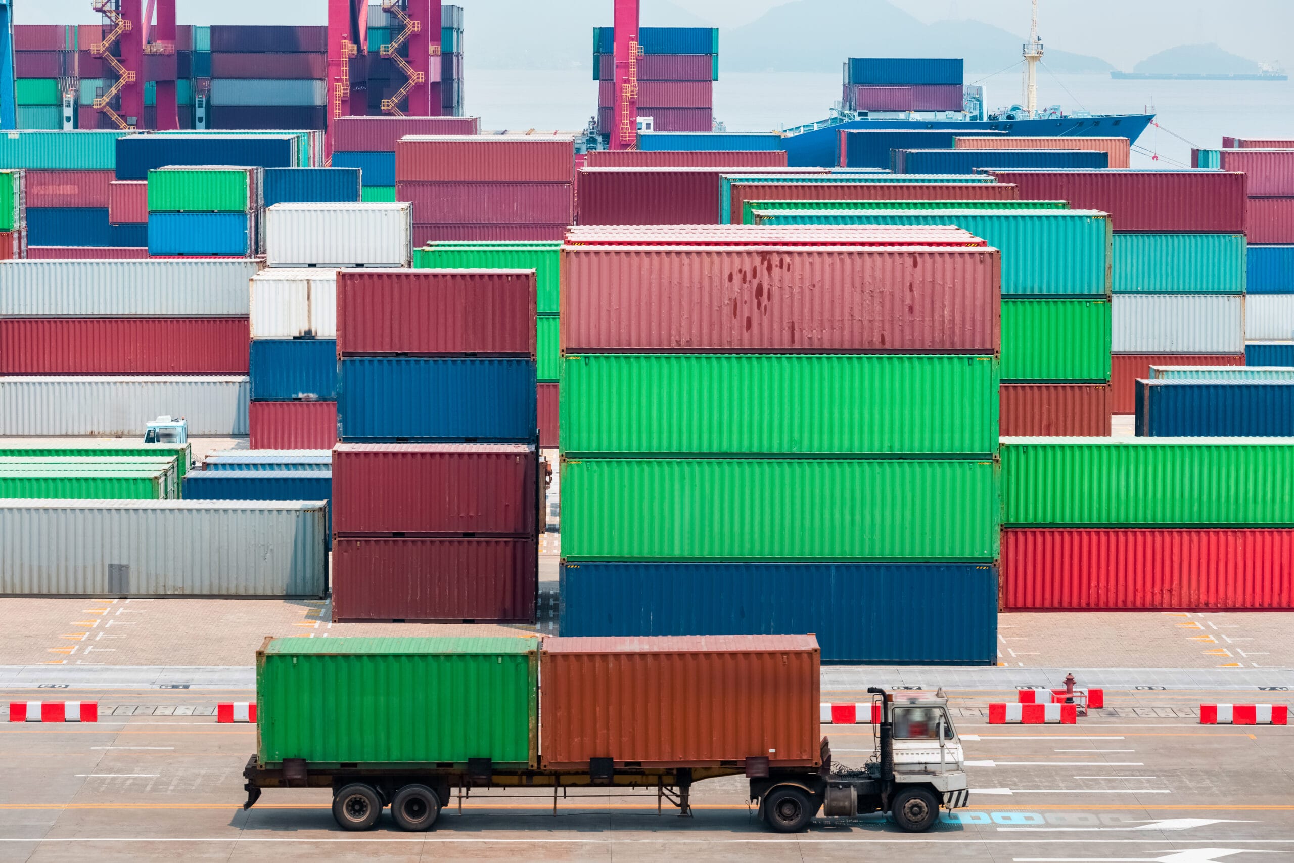 The complete guide to wireless EV charging at ports 1 modern container terminal closeup in ningbo, truck and container stack yard on shipping portmodern container terminal closeup in ningbo, truck and container stack yard on shipping port